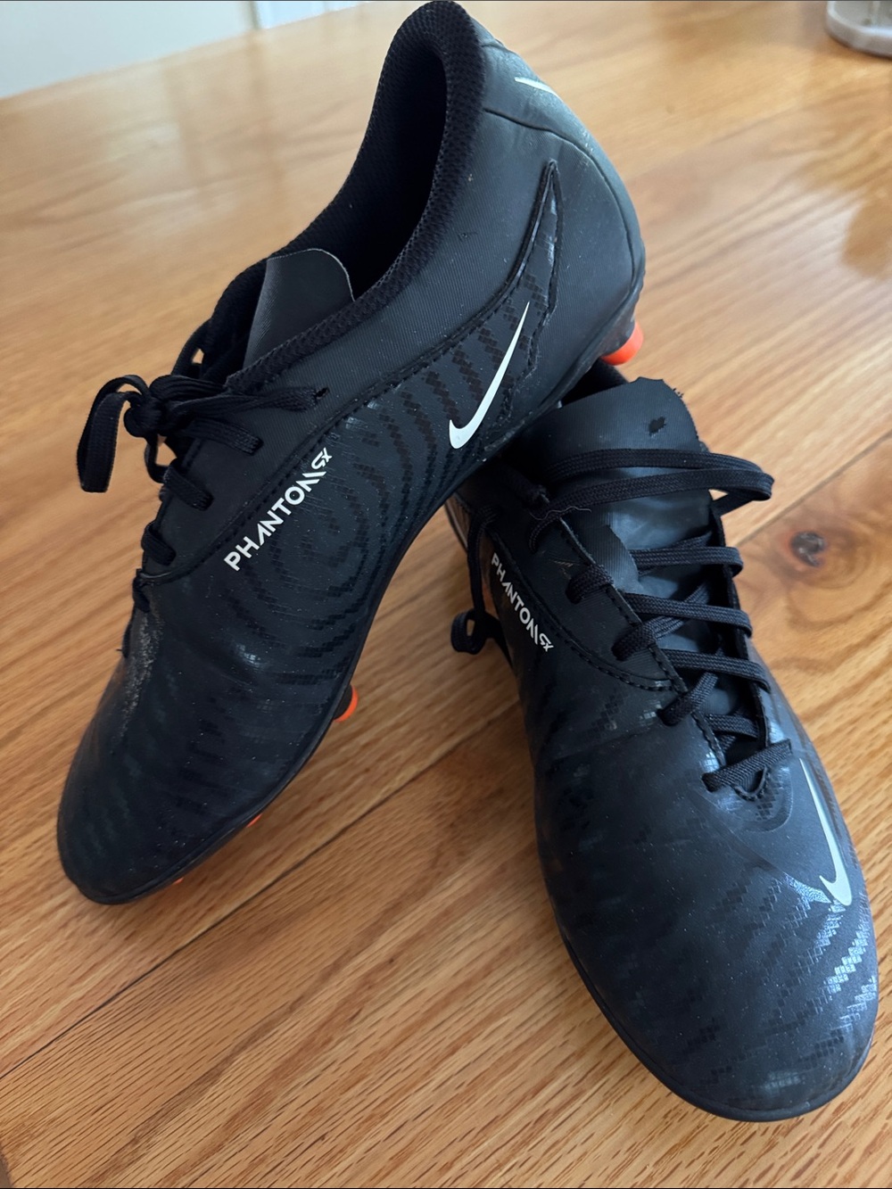 Nike Phantom GX Black Soccer Cleats with Orange Studs